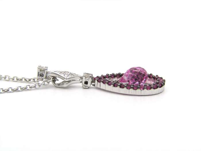 18K gold pink sapphire and diamond pendant.