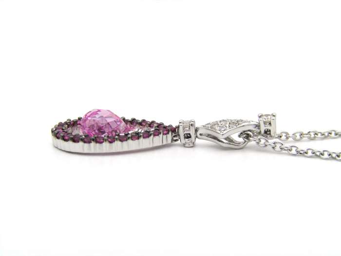 18K gold pink sapphire and diamond pendant.