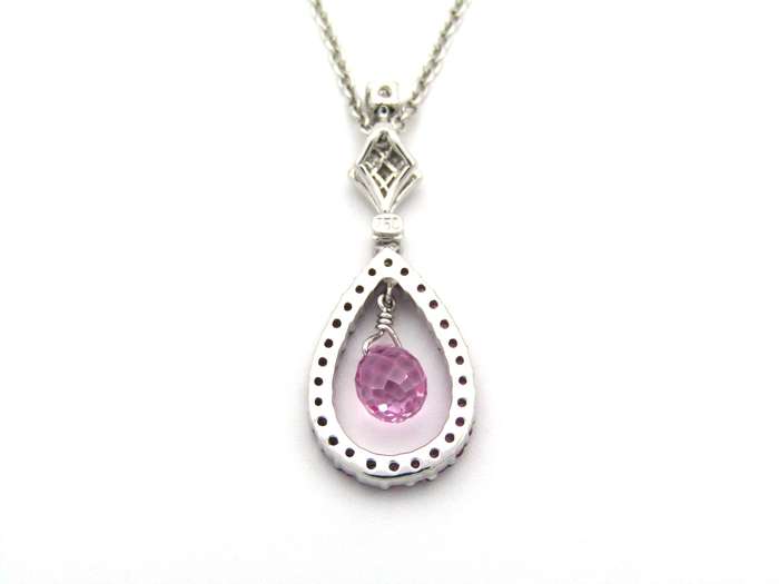 18K gold pink sapphire and diamond pendant.