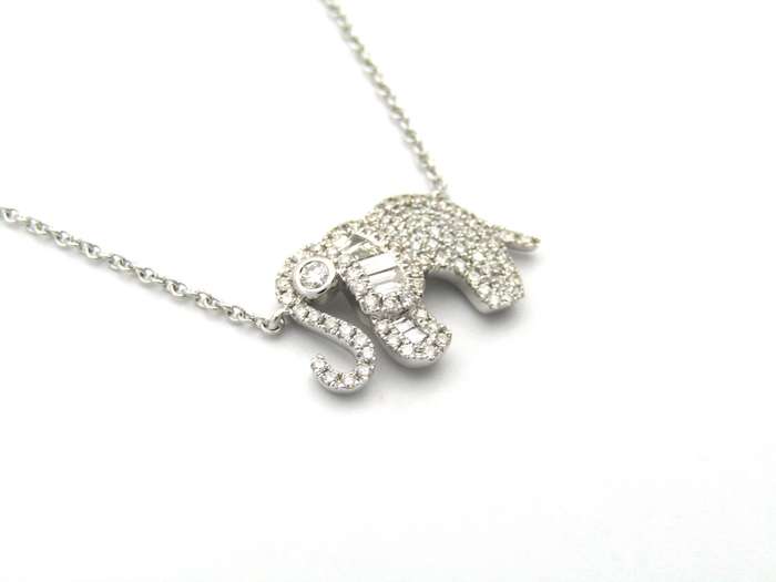 18K gold diamond elephant necklace.
