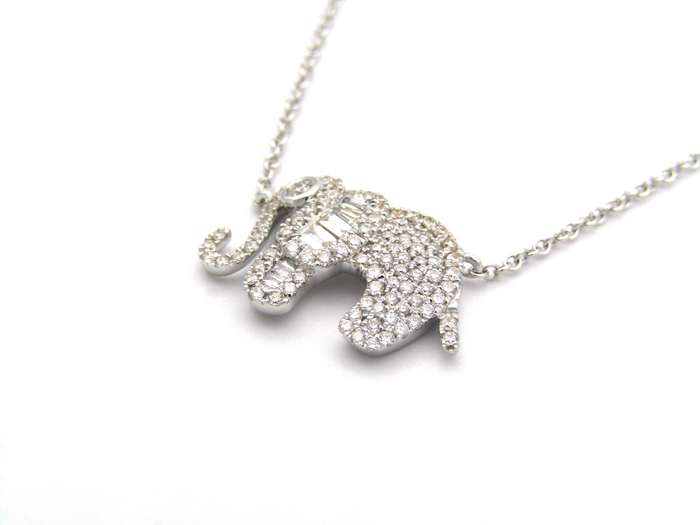 18K gold diamond elephant necklace.