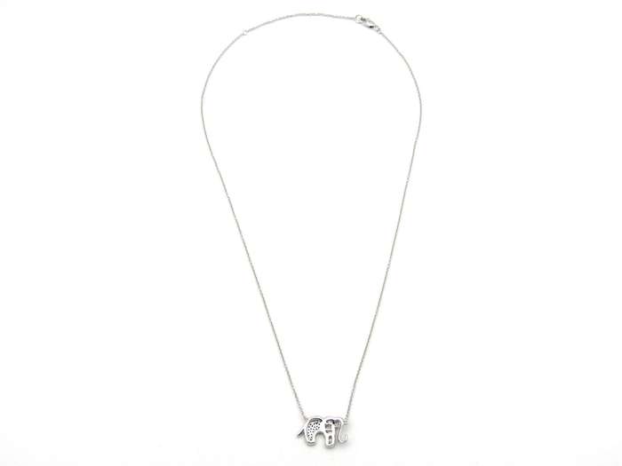 18K gold diamond elephant necklace.