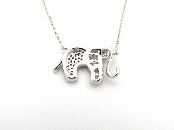 18K gold diamond elephant necklace.