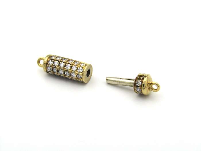 18K gold diamond clasp, circa 1970's.