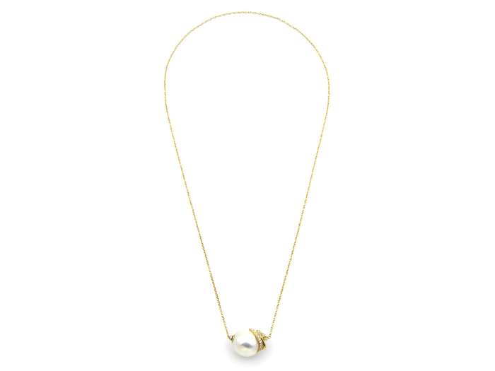 14K gold baroque pearl and diamond floating necklace.