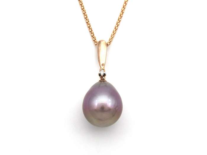 9K gold freshwater pearl and diamond pendant with 18K gold chain.