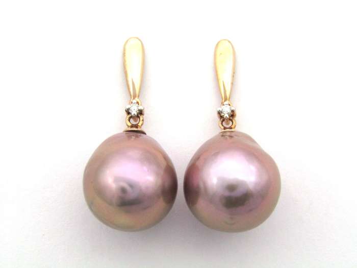 9K gold freshwater pearl and diamond dangle earrings.