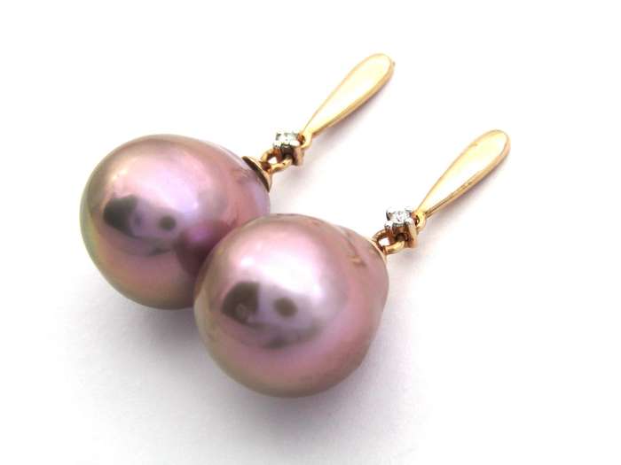 9K gold freshwater pearl and diamond dangle earrings.