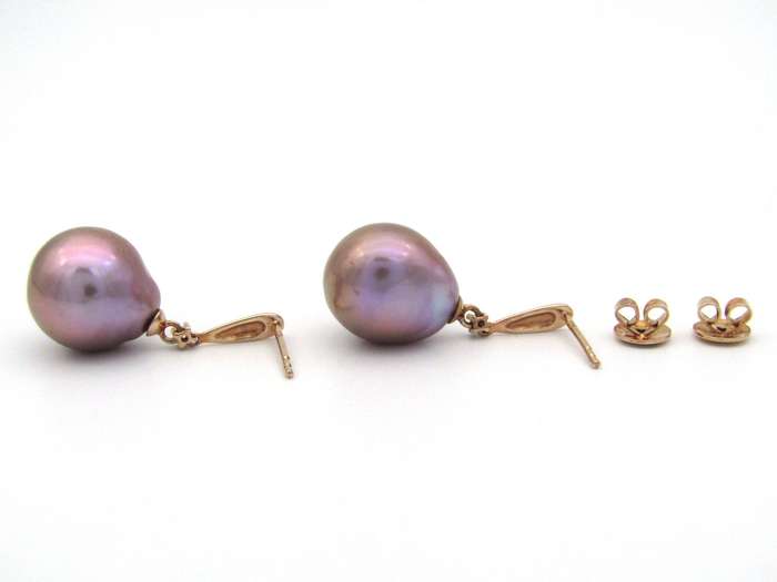 9K gold freshwater pearl and diamond dangle earrings.