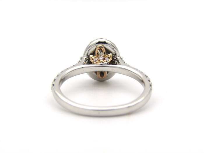Platinum and 18K gold Angel Halo diamond ring by Browns.