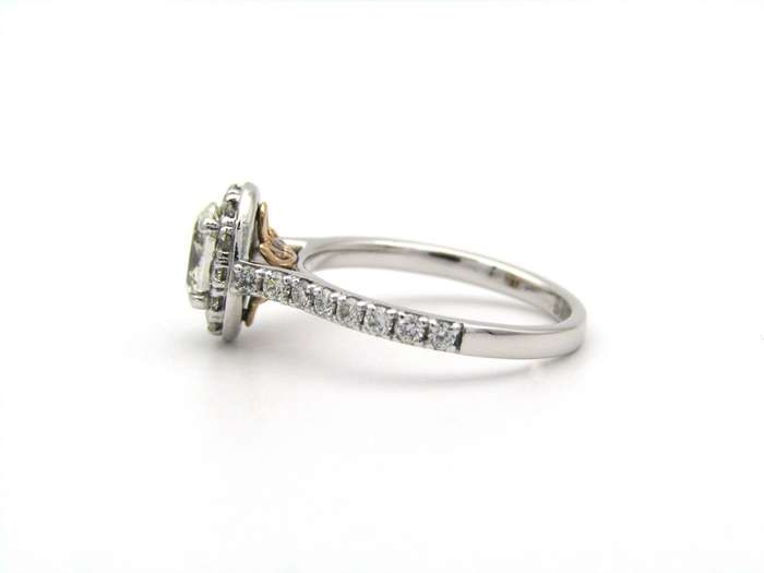 Platinum and 18K gold Angel Halo diamond ring by Browns.