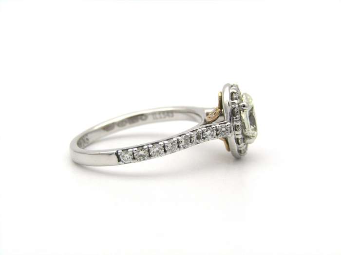 Platinum and 18K gold Angel Halo diamond ring by Browns.