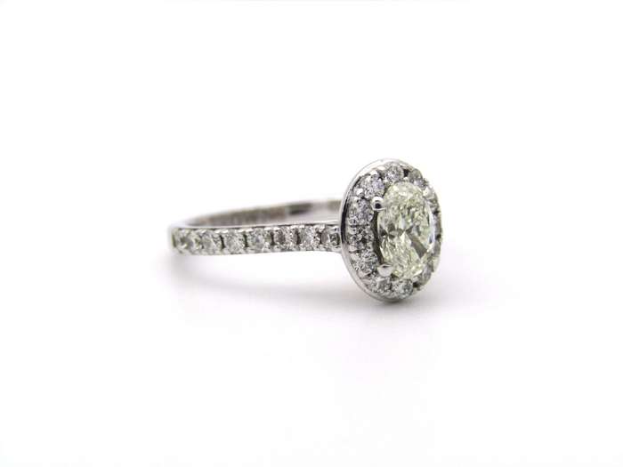 Platinum and 18K gold Angel Halo diamond ring by Browns.