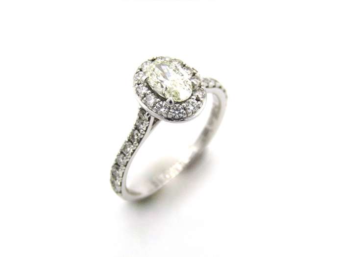Platinum and 18K gold Angel Halo diamond ring by Browns.
