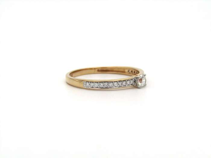 18K gold diamond ring.