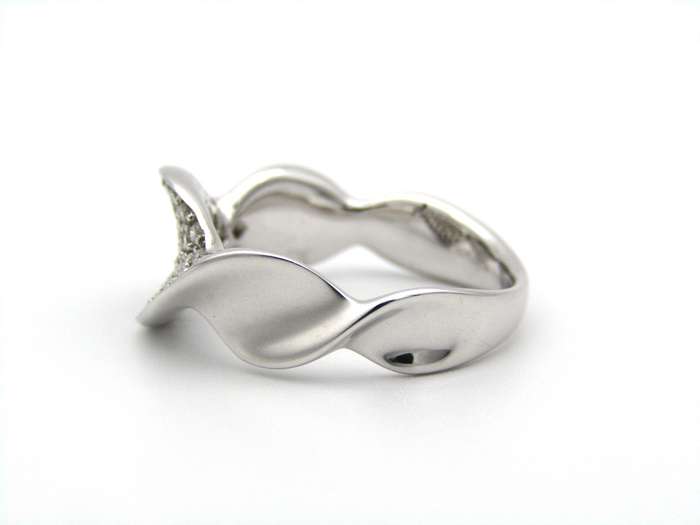 18K gold twist diamond ring.