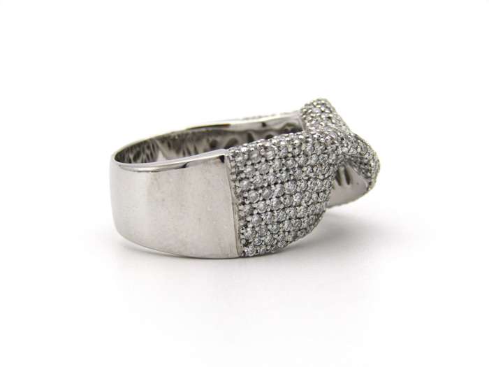 18K gold diamond twist ring.