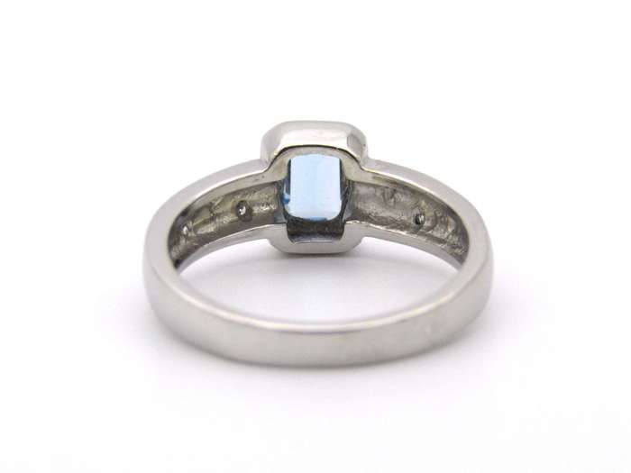 9K gold blue topaz and diamond ring by Browns.
