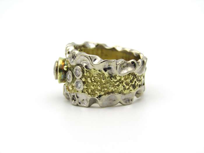 18K gold diamond ring.