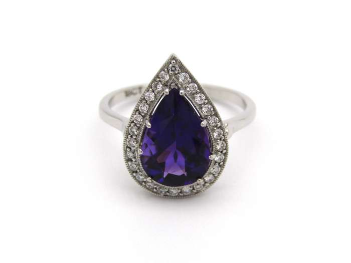 18K gold amethyst and diamond ring.
