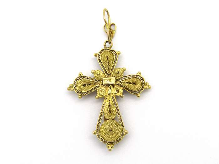 18kt gold filigree ruby cross, Circa 1940.
