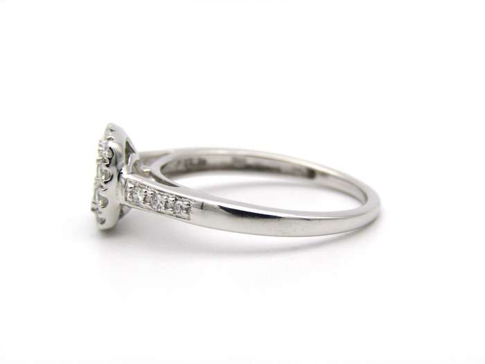 9K gold diamond ring.