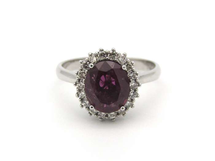 14K gold rubellite and diamond ring.