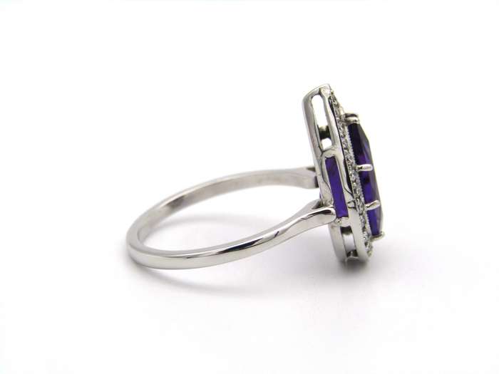 18K gold amethyst and diamond ring.