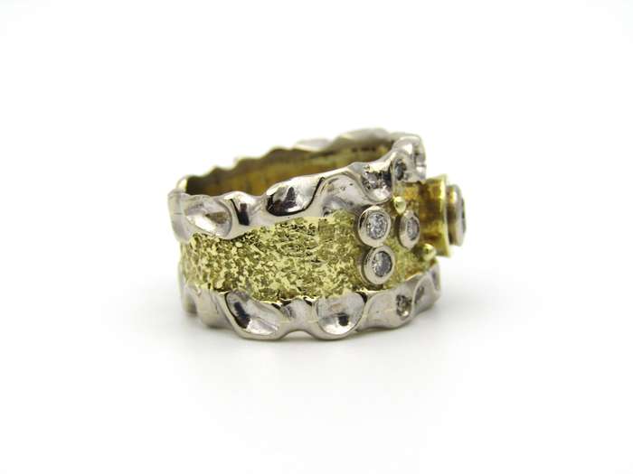 18K gold diamond ring.