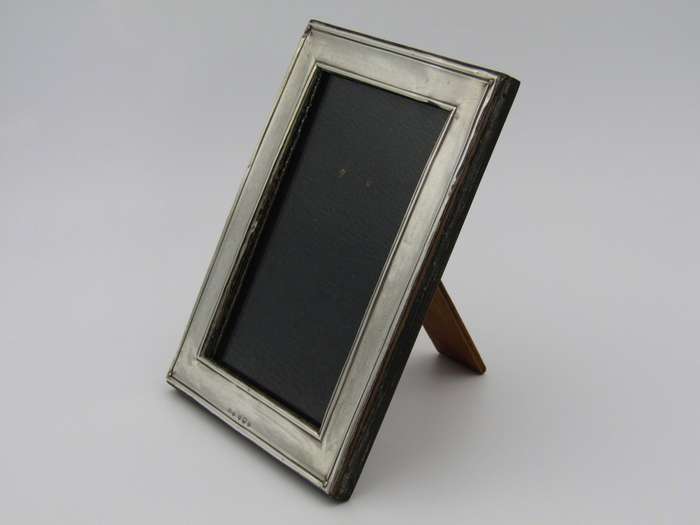 A sterling silver picture frame by Henry Williamson Ltd. Birmingham, 1912.