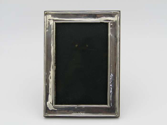 A sterling silver picture frame by Henry Williamson Ltd. Birmingham, 1912.
