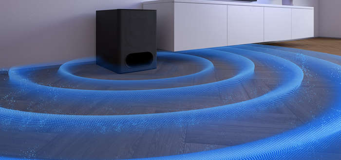 Sound waves emitting from subwoofer on the floor.