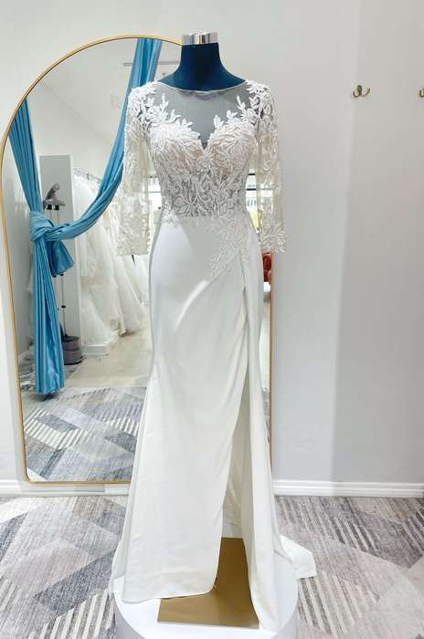 Tiara, Crepe Sheath with side slit , lace beaded bodice with sleeves.