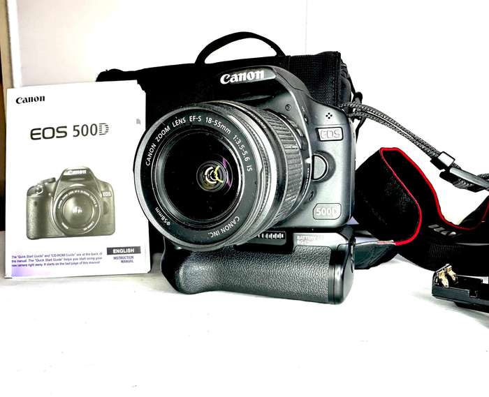 Canon EOS 500D DSLR Camera body Canon 18-55mm Lens Canon Original BG-E5 Battery grip