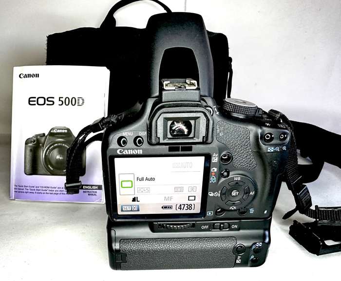 Canon EOS 500D DSLR Camera body Canon 18-55mm Lens Canon Original BG-E5 Battery grip