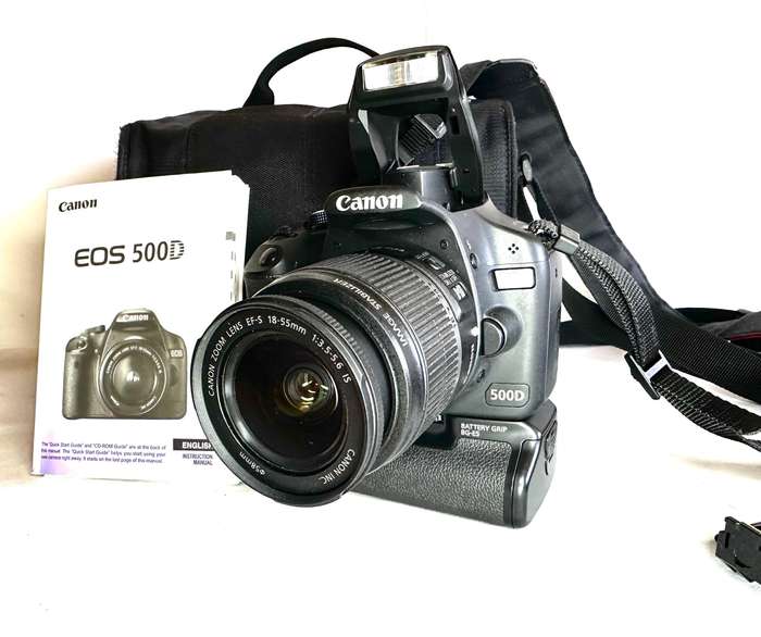 Canon EOS 500D DSLR Camera body Canon 18-55mm Lens Canon Original BG-E5 Battery grip
