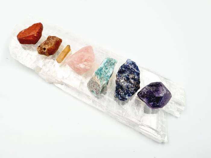 Raw Chakra Stones On A Selenite Slab