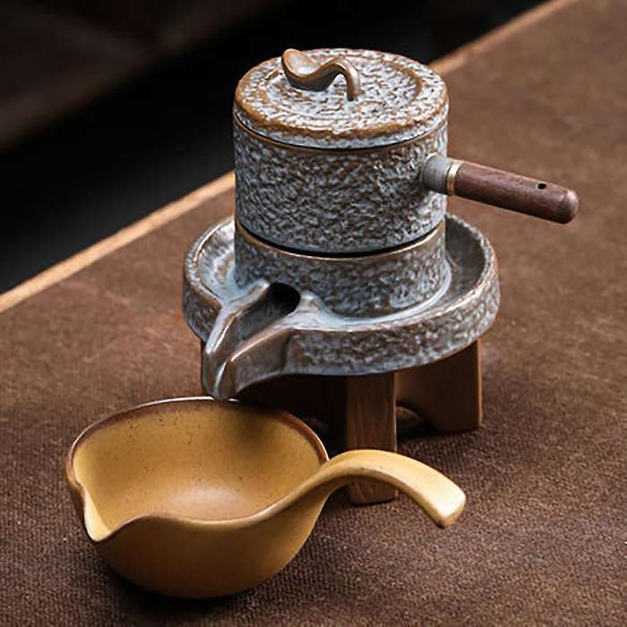 Pottery Lazy Stone Grinding Tea Set Rotating Water Teapot Anti Scalding Design Rotating Teapot for T