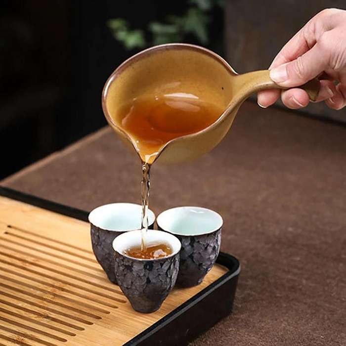 Pottery Lazy Stone Grinding Tea Set Rotating Water Teapot Anti Scalding Design Rotating Teapot for T