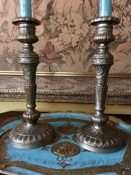 Vintage decorative candlesticks with floral design