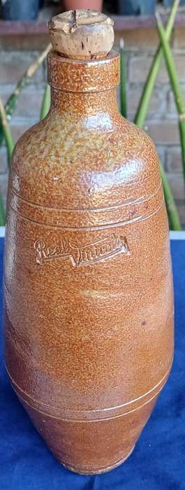 Vintage stoneware Real Vinicola wine bottle