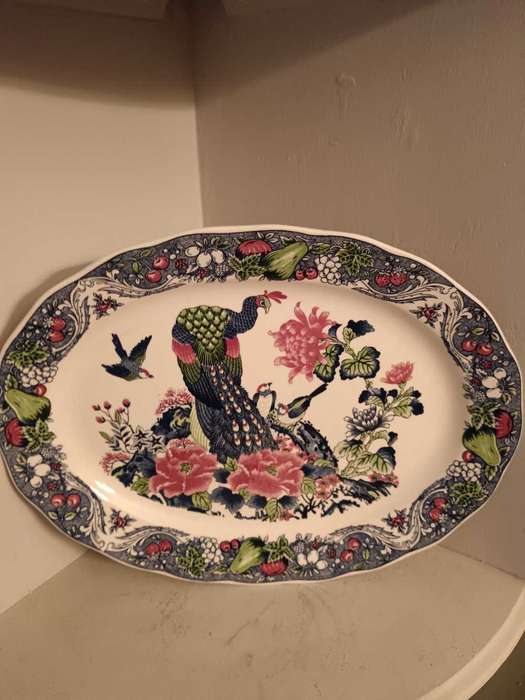 Large Imari Platter decorated with Peacocks and a border of Foliage and Fruit