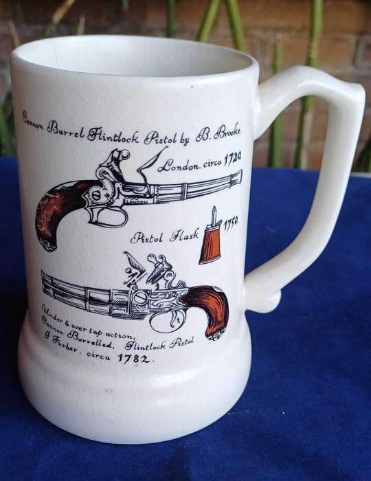 Canon barrel flintlock pistol cup