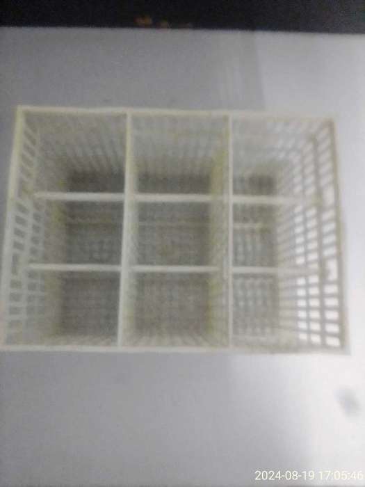 DISHWASHER CUTLERY BASKET.