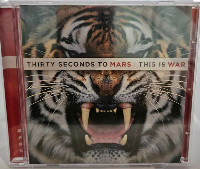 Thirty Seconds to Mars This is War   (753)