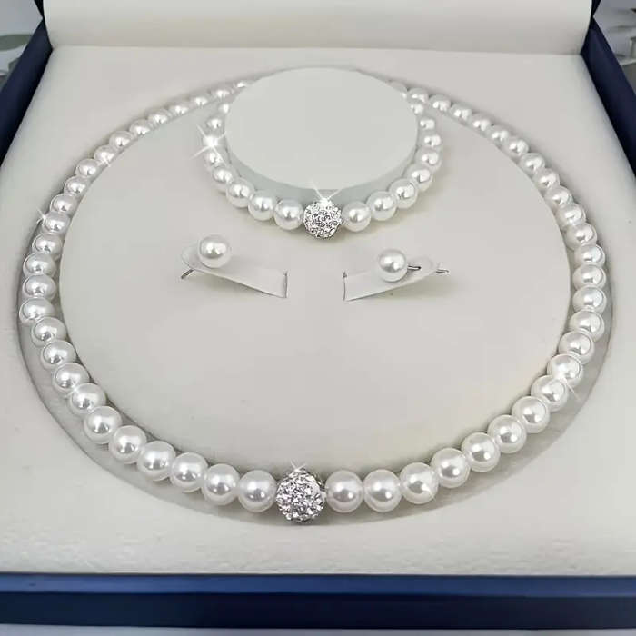 1 necklace + 1 bracelet + 2 earrings. Elegant and minimalist faux Imitation Pearl jewelry set