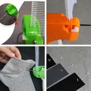 a kit consisting of a tagging gun 5 needles 1000 hair   needles a thick needle gun and a label gun details 4