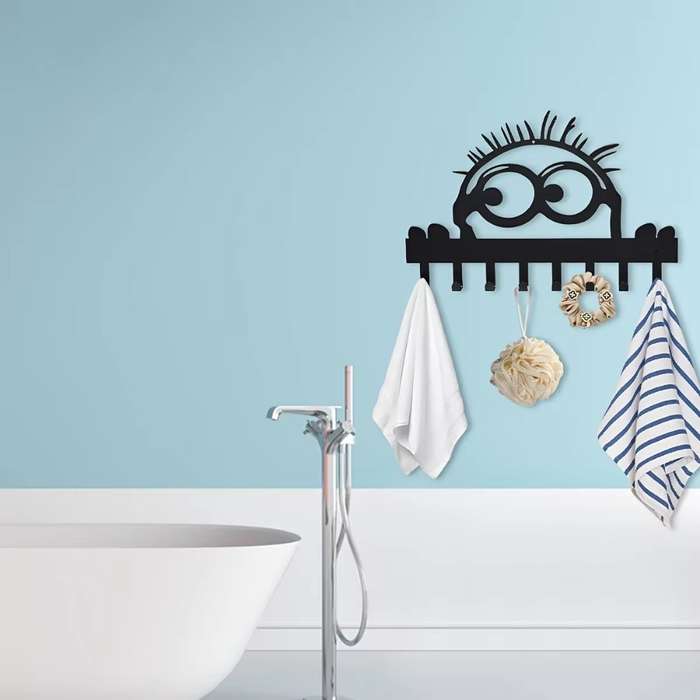 A single set of elegant wallmounted metal coat hooks with 8 hooks. Its a practical and stylish c