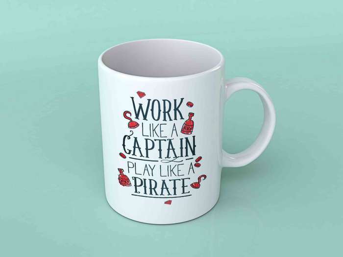 Work like a captain play like a pirate coffee mug