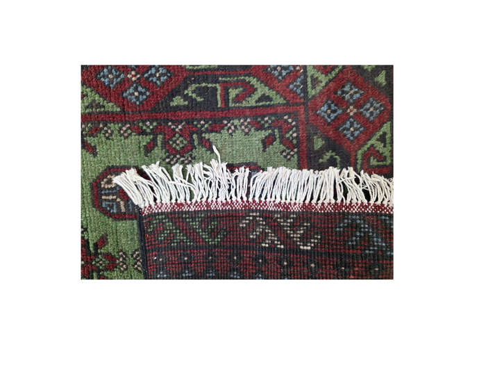 Fine green Afghan Kunduz Bukhara Carpet 579 x 78cm